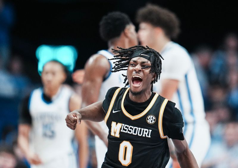 Missouri Tigers guard Anthony Robinson II (0) celebrates as the Tigers came back to defeat Kentucky 73-68 for the first time in program history during SEC college basketball Wednesday night at Rupp Arena in Lexington, Kentucky January 7, 2026.