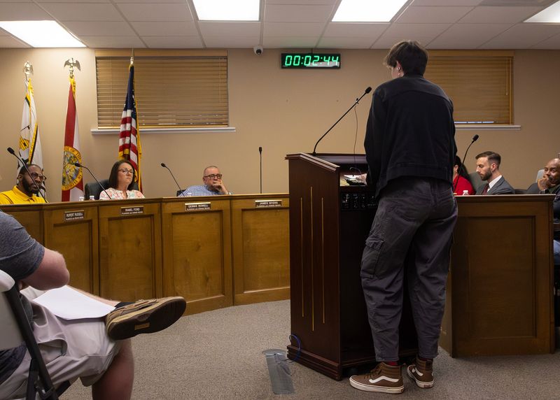 Fort Meade resident Riley Grant warns about negative environmental impacts of the planned data center at the April 7 meeting of the Fort Meade Planning and Zoning Board.