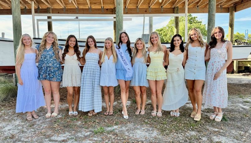 Ten young ladies will be competing to wear the crown of Miss Destin 2026. Standing from left are Kinley Parker, Elleanorah Remm, Andreia Barcelos, Estella Scoma, Hadley Wright, Miss Destin 2025 Bella Riggs, Kallie Causton, Kaylynn Hayles, Lacey Sherwood, Kendra Quaranto, and Baylie Moseley.
