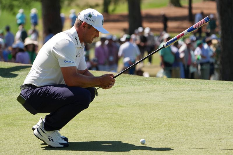 Apr 10, 2026; Augusta, Georgia, USA; Bryson DeChambeau lines up a putt on the seventh green during the second round of the Masters Tournament at Augusta National Golf Club. Mandatory Credit: Michael Madrid-Imagn Images