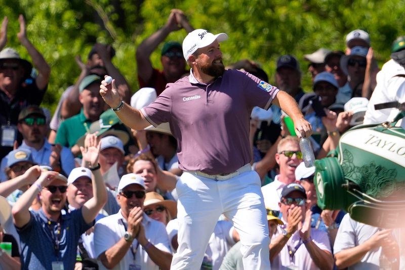 Shane Lowry celebrates after hitting a hole-in-one on the sixth hole during the third round of the Masters.