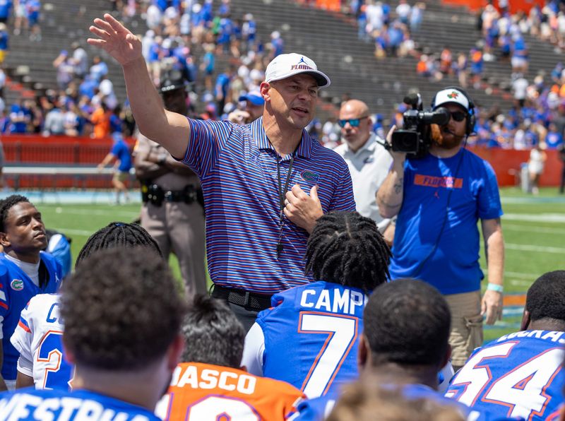 Florida head coach Jon Sumrall speaks to the team after the Orange and Blue game at Steve Spurrier Field at Ben Hill Griffin Stadium in Gainesville, FL on Saturday, April 11, 2026. [Alan Youngblood/Gainesville Sun]