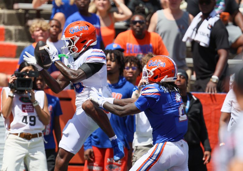Florida cornerback J'Vari Flowers (6) intercepts in the end zone during the second half of the Orange and Blue game at Steve Spurrier Field at Ben Hill Griffin Stadium in Gainesville, FL on Saturday, April 11, 2026. [Alan Youngblood/Gainesville Sun]