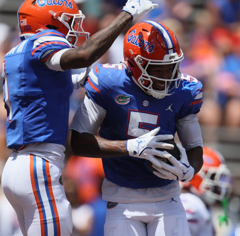 Florida wide receiver Micah Mays Jr. (5) celebrates during the first half of the Orange and Blue game at Steve Spurrier Field at Ben Hill Griffin Stadium in Gainesville, FL on Saturday, April 11, 2026. [Alan Youngblood/Gainesville Sun]