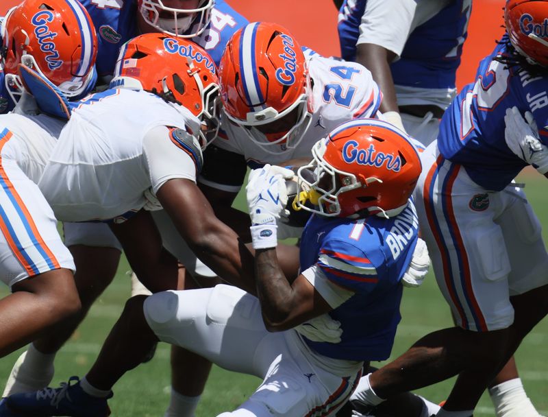 Florida wide receiver Vernell Brown III (1) gets stopped during the first half of the Orange and Blue game at Steve Spurrier Field at Ben Hill Griffin Stadium in Gainesville, FL on Saturday, April 11, 2026. [Alan Youngblood/Gainesville Sun]