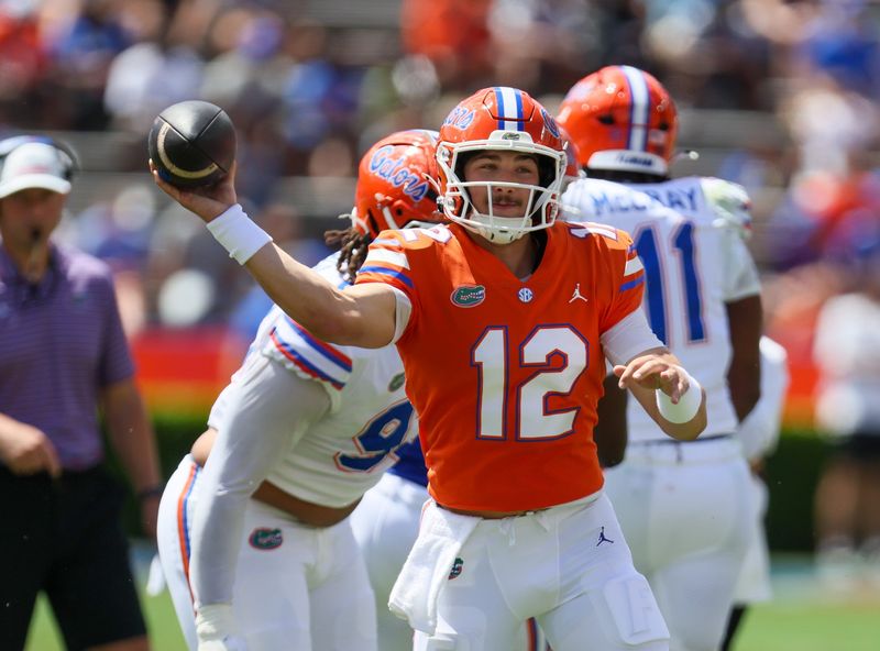 Florida quarterback Aaron Philo (12) passes during the second half of the Orange and Blue game at Steve Spurrier Field at Ben Hill Griffin Stadium in Gainesville, FL on Saturday, April 11, 2026. [Alan Youngblood/Gainesville Sun]