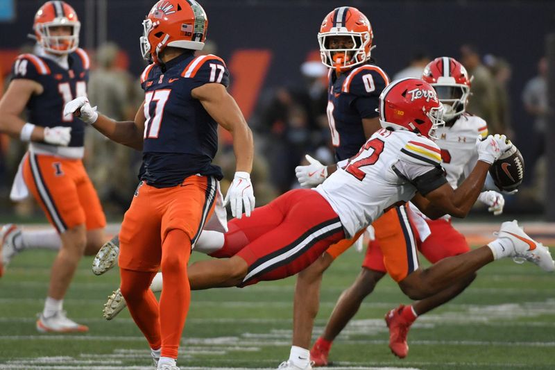 Nov 15, 2025; Champaign, Illinois, USA; Maryland Terrapins defensive back Jalen Huskey (22) intercepts a pass during the first hal against the Illinois Fighting Illini at Memorial Stadium. Mandatory Credit: Ron Johnson-Imagn Images
