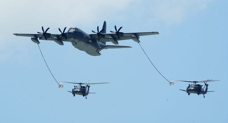U.S. Air Force Reserve 920th Rescue Wing personnel demonstrate aerial refueling using an HC-130J Combat King II transport plane and two HH-60W Jolly Green II helicopters during last month's Air Dot Show Cocoa Beach.