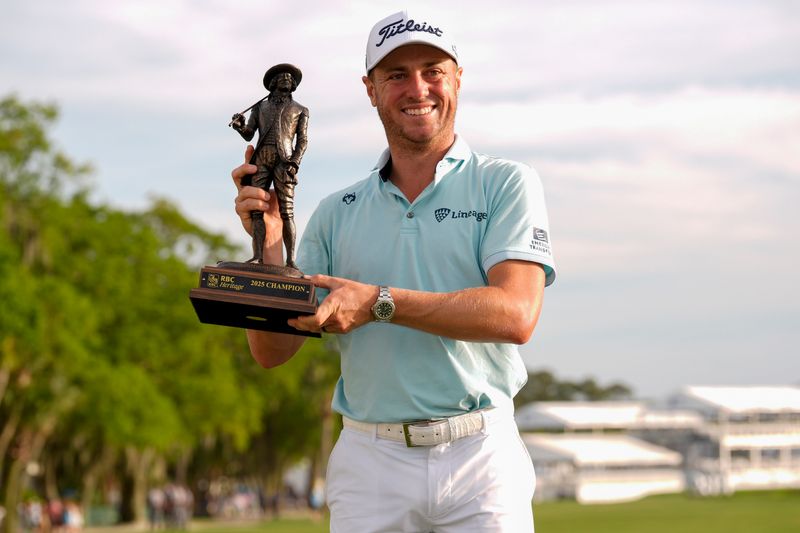 Justin Thomas holds his winners trophy during the final round of the RBC Heritage golf tournament in Hilton Head Island, South Carolina.