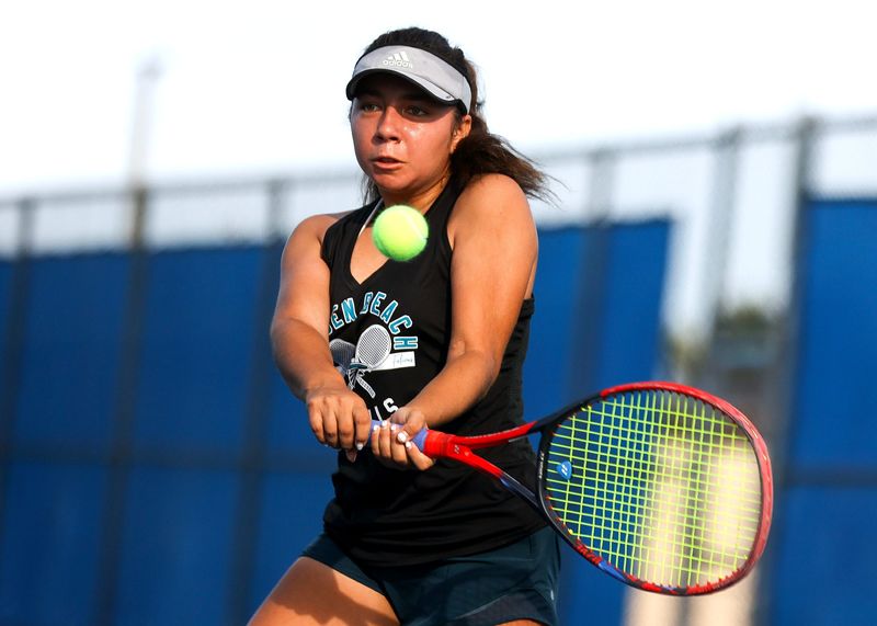 Jensen Beach's Carissa Regis competes in the District 14-3A tennis championship, April 14, 2026, at Martin County High School.