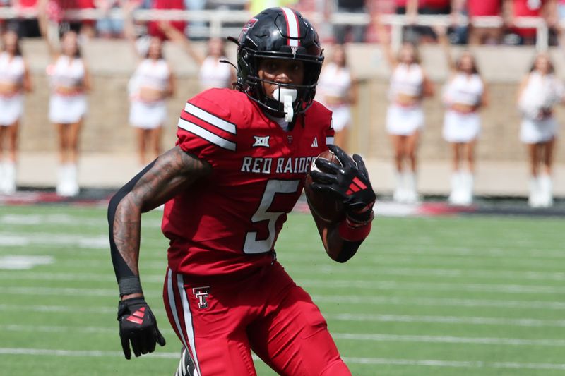 Sep 21, 2024; Lubbock, Texas, USA; Texas Tech Red Raiders wide receiver Caleb Douglas (5) rushes against the Arizona State Sun Devils in the first half at Jones AT&T Stadium and Cody Campbell Field. Mandatory Credit: Michael C. Johnson-Imagn Images