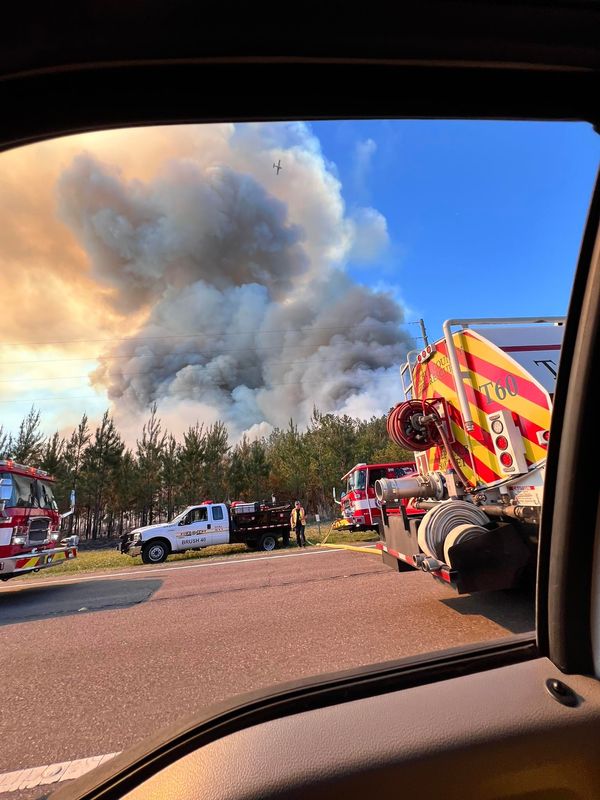 Crews battle a 150-acre wildfire on April 15, 2026, in the Balu Forest on the north side of State Road 26 in east Alachua County.