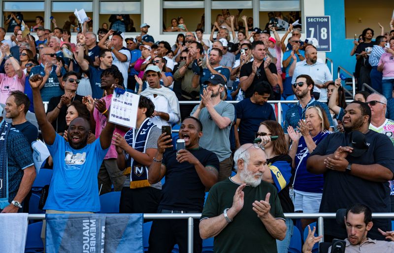 Fans cheer as Orlando City SC and FC Naples prepare to play the Lamar Hunt U.S. Open Cup Round of 32 game at Paradise Coast Sports Complex in Naples, Fla., on Wednesday, April 15, 2026.