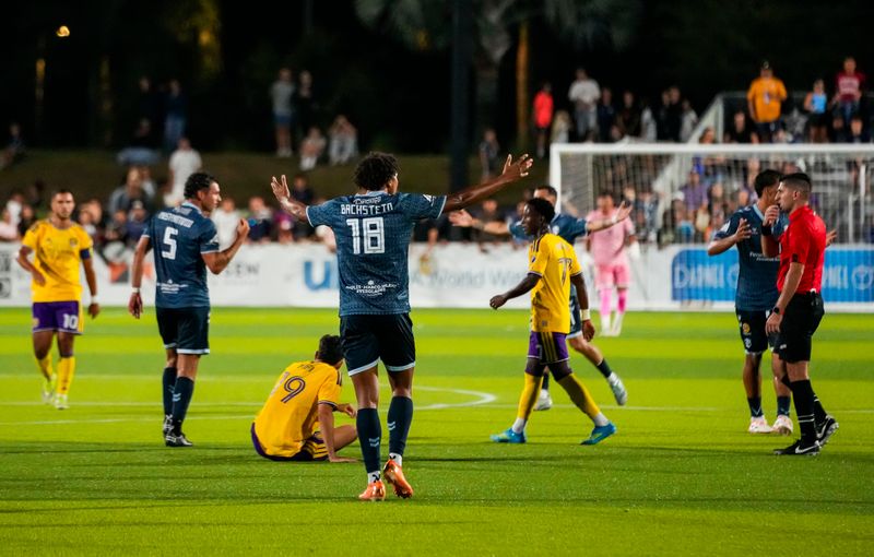 FC Naples players protest after a goal isn't called during the second half of the Lamar Hunt U.S. Open Cup Round of 32 game against Orlando City SC at Paradise Coast Sports Complex in Naples, Fla., on Wednesday, April 15, 2026.
