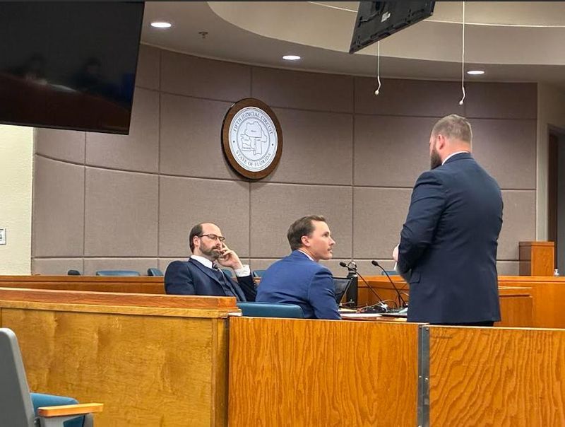 Lawyers from the prosecution and the defense talk to each other during a break of the Joseph Vincent O'Rourke trial on April 16, 2026.