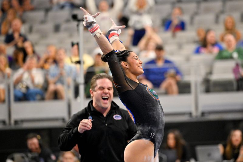 Apr 16, 2026; Fort Worth, TX, USA; University of Florida gymnast Kayla DiCello performs on bars during semifinals for the 2026 NCAA Women’s Gymnastics National Championships at Dickies Arena. Mandatory Credit: Jerome Miron-Imagn Images