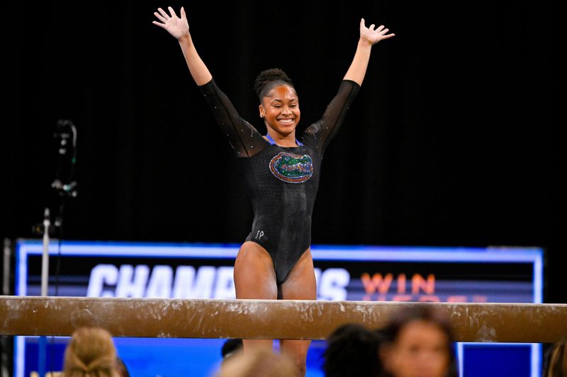 Apr 16, 2026; Fort Worth, TX, USA; University of Florida gymnast Skye Blakely performs on beam during semifinals for the 2026 NCAA Women’s Gymnastics National Championships at Dickies Arena. Mandatory Credit: Jerome Miron-Imagn Images