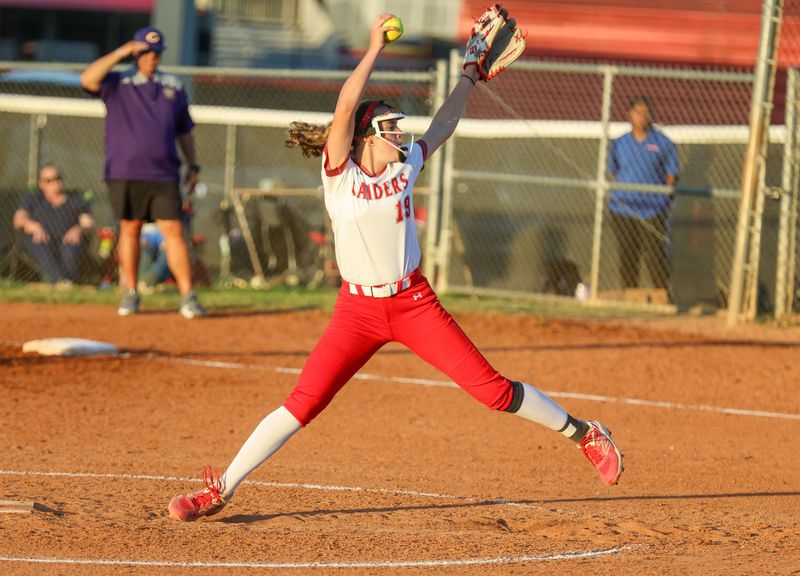 Santa Fe p util Rylee Swilley (19) pitches during an FHSAA softball game at Santa Fe High School in Alachua, FL on Thursday, April 16, 2026. [Alan Youngblood/Gainesville Sun]