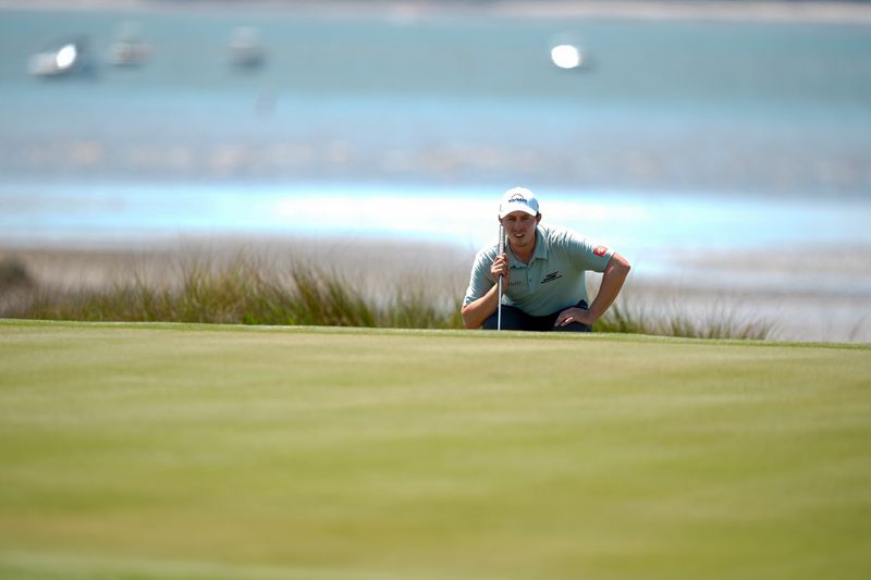 Apr 17, 2026; Hilton Head, South Carolina, USA; Matt Fitzpatrick eyes his line on 18 green during the second round of the RBC Heritage golf tournament. Mandatory Credit: Jim Dedmon-Imagn Images