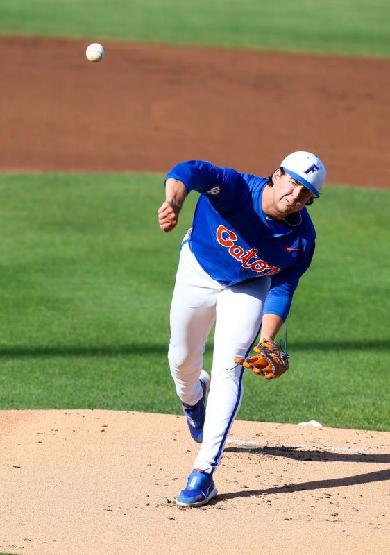 Florida pitcher Liam Peterson (12) pitches durning and NCAA baseball game against Auburn at Condron Family Ballparkin Gainesville, FL on Friday, April 17, 2026. [Alan Youngblood/Gainesville Sun]
