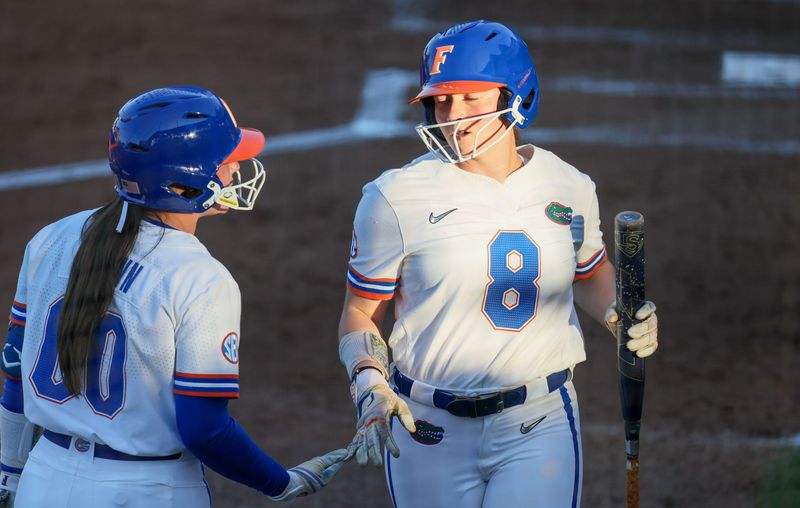 Florida catcher Jocelyn Erickson (8) celebrates making a run durning an NCAA softball game at Katie Seashole Pressly Stadium in Gainesville, FL on Friday, April 17, 2026. [Alan Youngblood/Gainesville Sun]