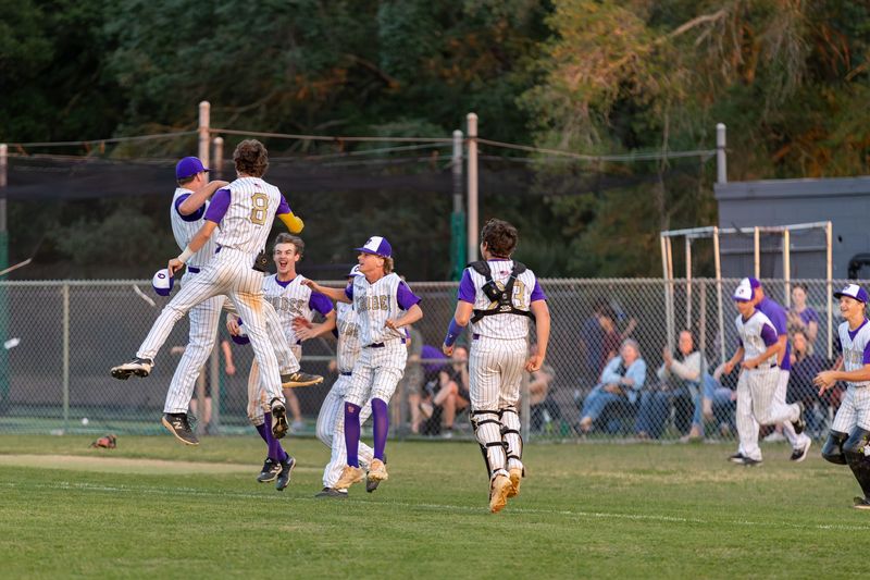 Okeechobee players celebrate winning a baseball District 13-5A Final against Sebastian River, April 17, 2026, at Okeechobee High School. Okeechobee won 6-0.