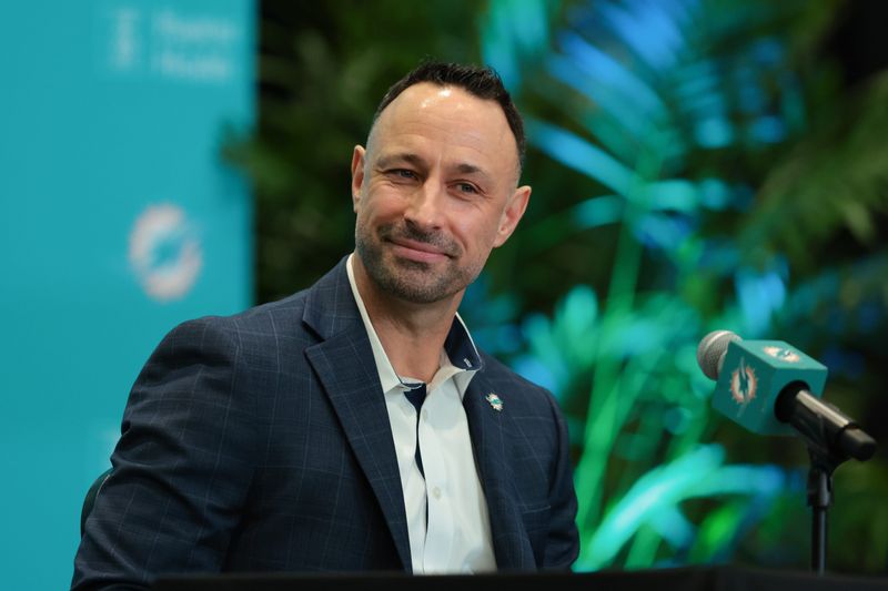 Jan 22, 2026; Miami Gardens, FL, USA; Miami Dolphins general manager Jon-Eric Sullivan reacts during his introductory press conference at Baptist Health Training Complex. Mandatory Credit: Sam Navarro-Imagn Images