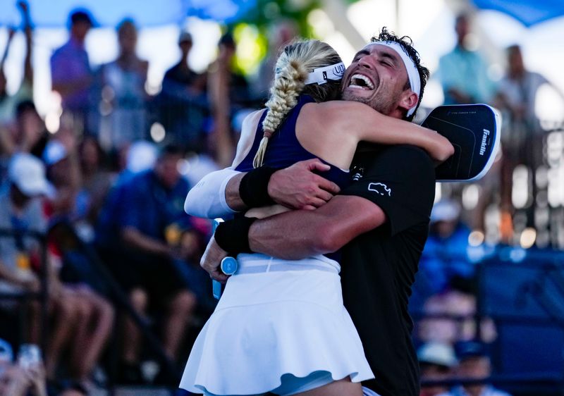 Jay Devilliers and Anna Leigh Waters hug after winning the mixed pro doubles gold medal match of the Franklin U.S. Open Pickleball Championships against Casey Diamond and Sofia Sewing at East Naples Community Park in Naples, Fla., on Saturday, April 18, 2026.