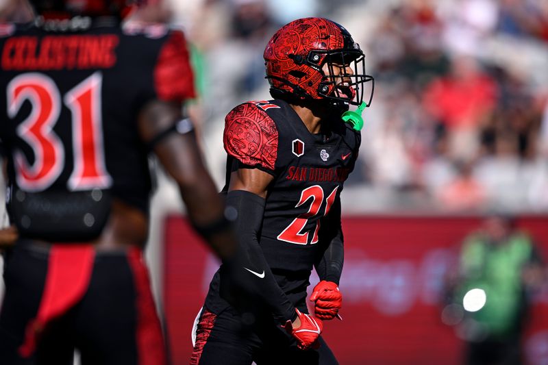 Aug 26, 2023; San Diego, California, USA; San Diego State Aztecs cornerback Chris Johnson (21) celebrates after a stop against the Ohio Bobcats during the first half at Snapdragon Stadium. Mandatory Credit: Orlando Ramirez-USA TODAY Sports