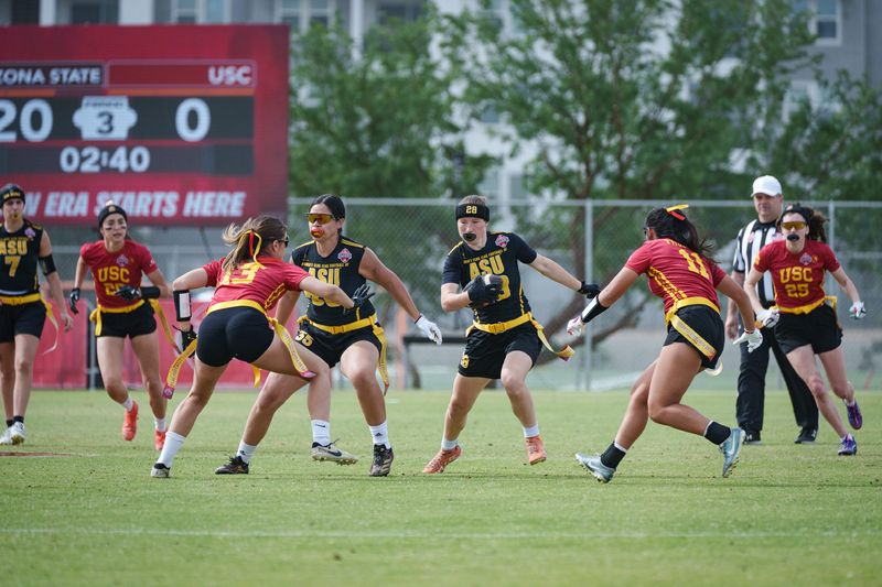 Katrina Kowitz (28) runs with the ball as ASU plays USC in the Fiesta Bowl Classic women's flag football quarterfinals on April 19, 2026, in Tempe.