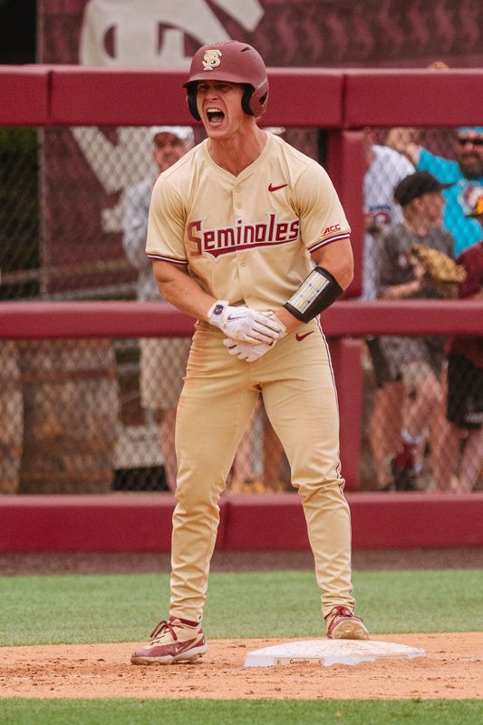 FSU baseball's Nathan Cmeyla celebrates a triple against Notre Dame on Sunday, April 19, 2026 at Dick Howser Stadium.