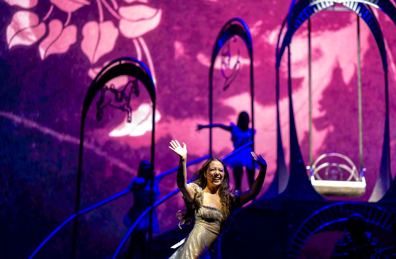 Laufey waves to fans as she takes the stage at the Outdoor Theatre during Weekend 2 of the Coachella Valley Music and Arts Festival in Indio, Calif., Sunday, April 19, 2026.