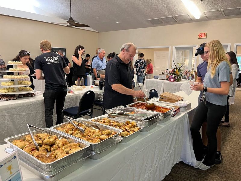 Guests sample offerings from various local restaurants and caterers at a previous Tasteful Affair event, hosted at Port Orange's Riverside Pavilion.