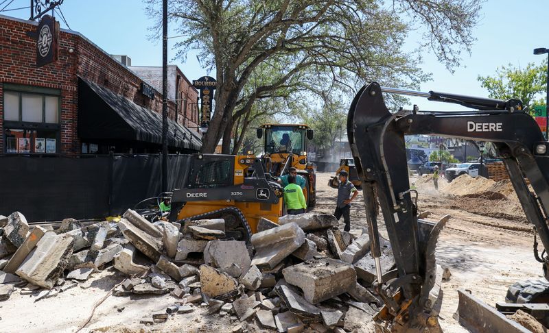 Scorpio Construction crews work Tuesday, April 21, 2026, along Southwest First Avenue between Main Street and Southwest Second Street in downtown Gainesville, Fla., as construction continues on the city’s Streatery project. The $4.5 million project will convert two blocks into a pedestrian-focused corridor for outdoor dining, events and public gatherings. Construction is expected to be completed this fall.