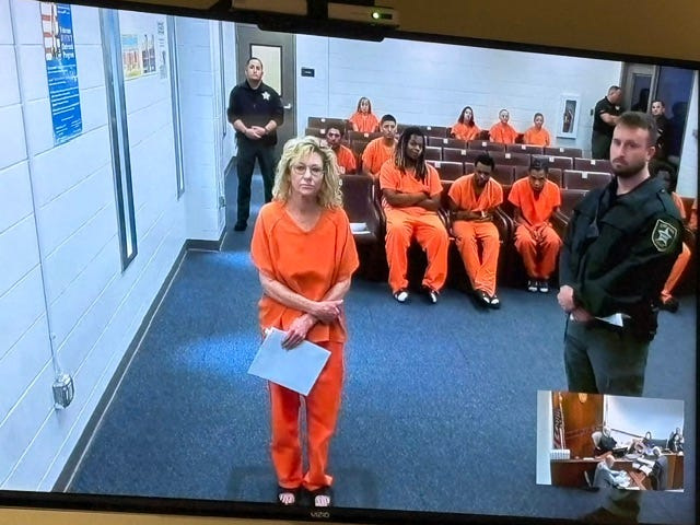 Naples Mayor Teresa Heitmann, 62, on Tuesday, April 21, 2026, appeared remotely from the Collier County Jail after her arrest for violating her probation.