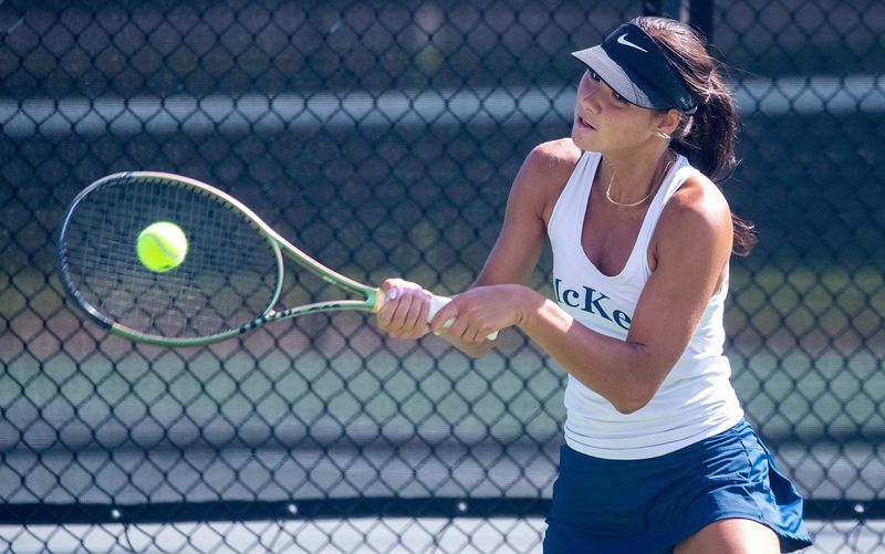 McKeel junior Briley Davis hits a backhand against Citrus' Hannah Hughes on Tuesday in the Class 2A, Region 4 semifinals at the Beerman Family Tennis Center.