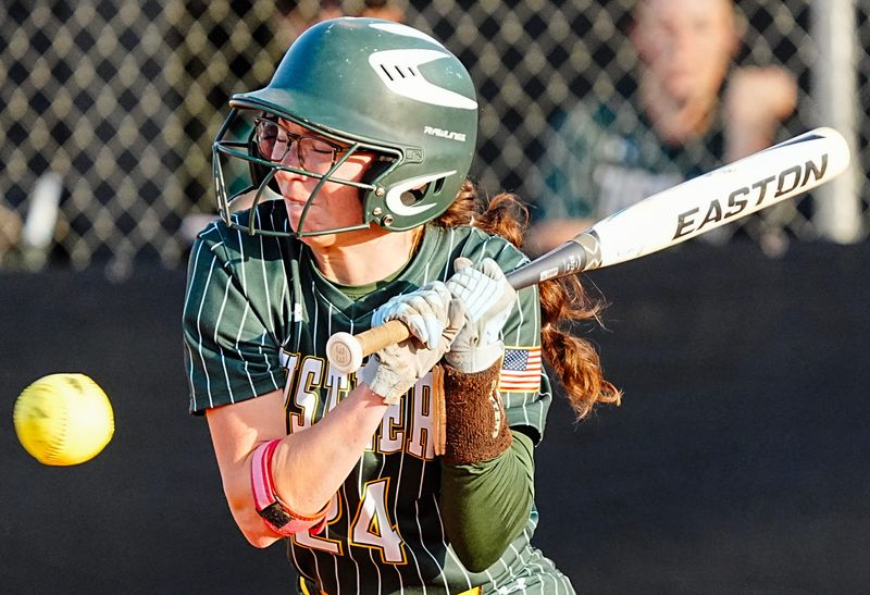 Madelyn Oesterle of Melbourne Central Catholic is hit by a Merritt Island pitch during their game April 22, 2026. Craig Bailey, FLORIDA TODAY via USA TODAY NETWORK