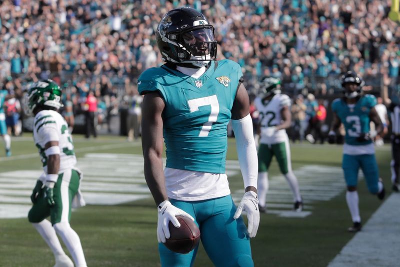 Dec 14, 2025; Jacksonville, Florida, USA; Jacksonville Jaguars wide receiver Brian Thomas Jr. (7) reacts after scoring a touchdown in the first quarter against the New York Jets at EverBank Stadium. Mandatory Credit: Travis Register-Imagn Images