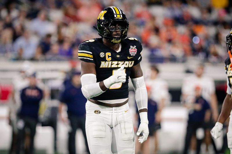 Missouri Tigers defensive end Zion Young (9) looks on before a play against the Virginia Cavaliers in the first half at EverBank Stadium on Dec. 27, 2025 in Jacksonville, Florida.