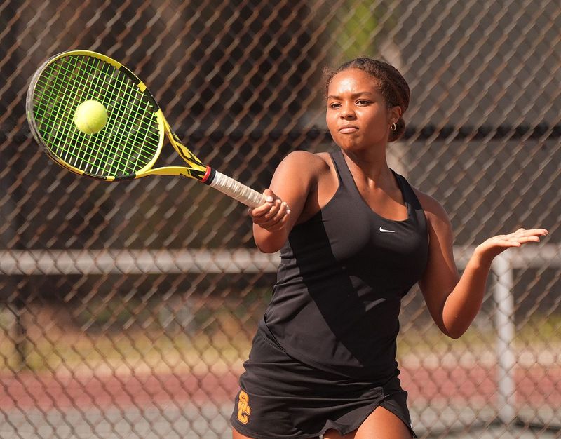 Spruce Creek’s Giselle Adekunle plays against Creekside during the girls tennis regional finals on April 23, 2026, at Spruce Creek High School.