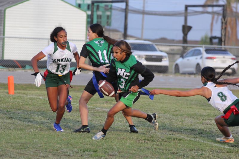 Haines City flag football won 33-12 over a very good George Jenkins team in the district championship game Thursday, April 23, 2026, at Haines City High School. In these pictures are No. 3 Zebrielle Canaday, No. 23 Nyla Brinson and No. 1 Myah Batts.