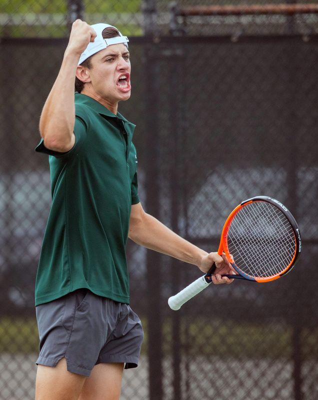McKeel's Davin Twiss celebrates a point during his No. 1 singles match against Citrus on Thurday afternoon in the Class 2A, Region 4 finals at the Beerman Family Tennis Center.