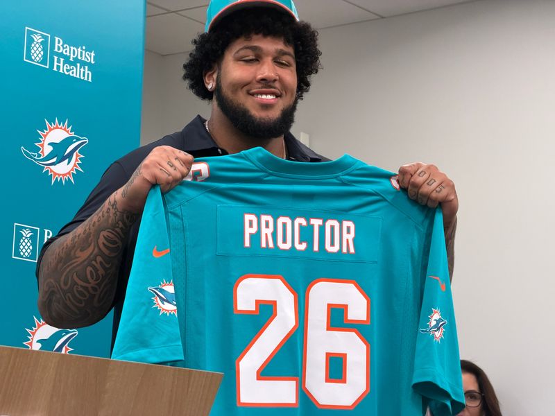 Miami Dolphins' first-round pick Kadyn Proctor with his new jersey on April 24, 2026.
