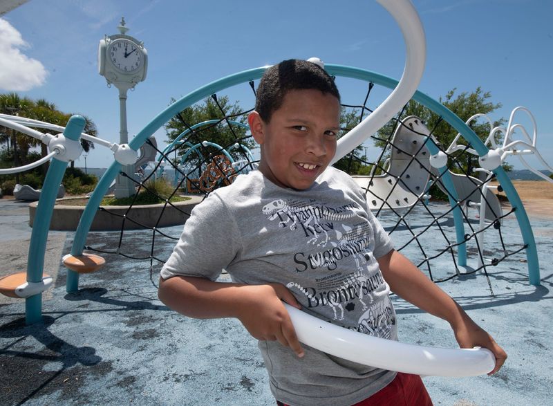 Pensacola second-grader Quentin Smith spends the afternoon enjoying the playground equipment at the Community Maritime Park on April 24, 2026. Smith is a semifinalist in America's Favorite Student competition, a fundraiser for the Planetary Society.