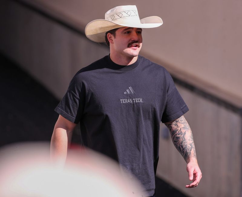 Jacob Rodriguez walks the field before the Texas Tech football team's spring game, Friday, April 17, 2026, at Jones AT&T Stadium.