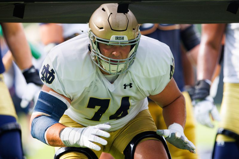 Notre Dame offensive lineman Billy Schrauth participates in a drill during a Notre Dame football practice at Irish Athletic Center on Tuesday, Aug. 6, 2024, in South Bend.