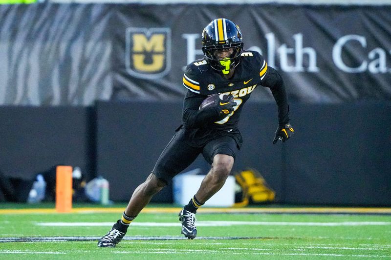 Aug 28, 2025; Columbia, Missouri, USA; Missouri Tigers wide receiver Kevin Coleman Jr. (3) returns a kick against the Central Arkansas Bears during the game at Faurot Field at Memorial Stadium. Mandatory Credit: Denny Medley-Imagn Images