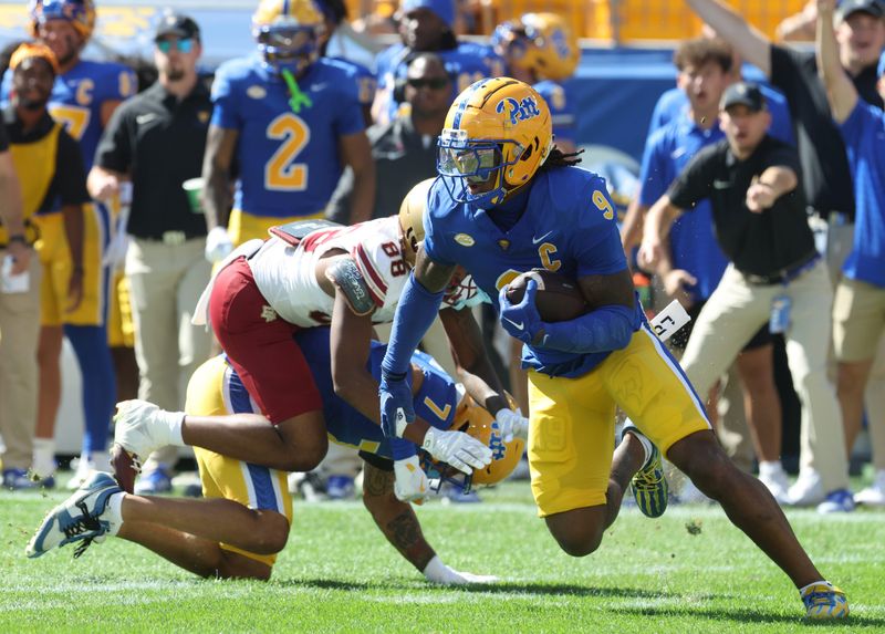 Oct 4, 2025; Pittsburgh, Pennsylvania, USA; Pittsburgh Panthers linebacker Kyle Louis (9) runs after fumble recovery against the Boston College Eagles during the second quarter at Acrisure Stadium. Mandatory Credit: Charles LeClaire-Imagn Images