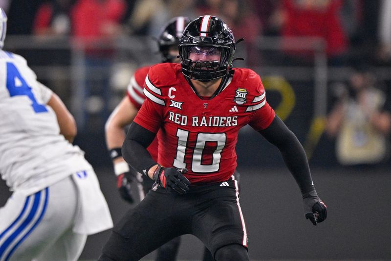 Dec 6, 2025; Arlington, TX, USA; Texas Tech Red Raiders linebacker Jacob Rodriguez (10) drops in coverage during the game between the Red Raiders and the Cougars at AT&T Stadium. Mandatory Credit: Jerome Miron-Imagn Images