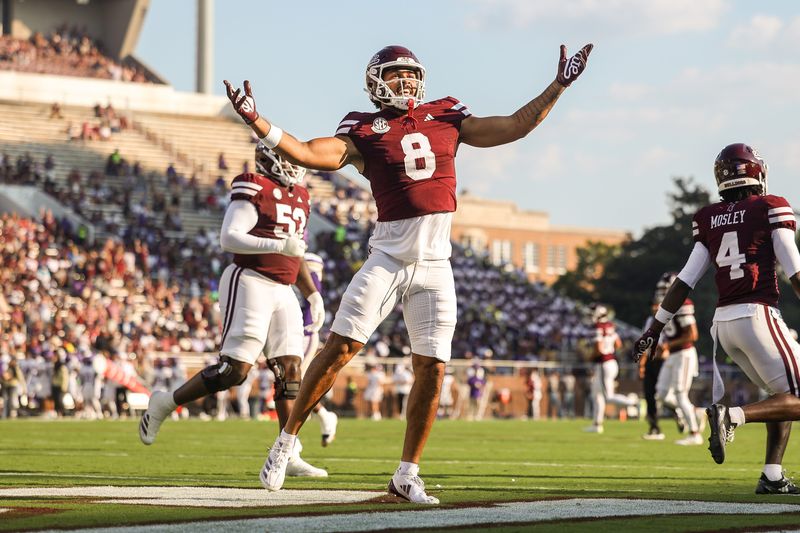 Sep 13, 2025; Starkville, Mississippi, USA; Mississippi State Bulldogs tight end Seydou Traore (8) reacts after a touchdown during the first quarter against the Alcorn State Braves at Davis Wade Stadium at Scott Field. Mandatory Credit: Wesley Hale-Imagn Images
